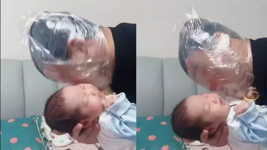 超細心爸爸裹保鮮膜親吻寶寶,神操作獲網友點贊:這個老爸太有愛